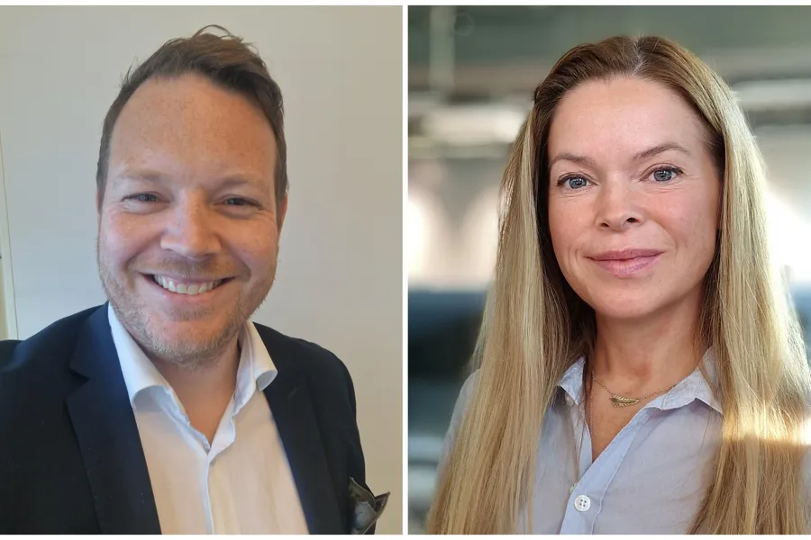 En mann og en kvinne som smiler